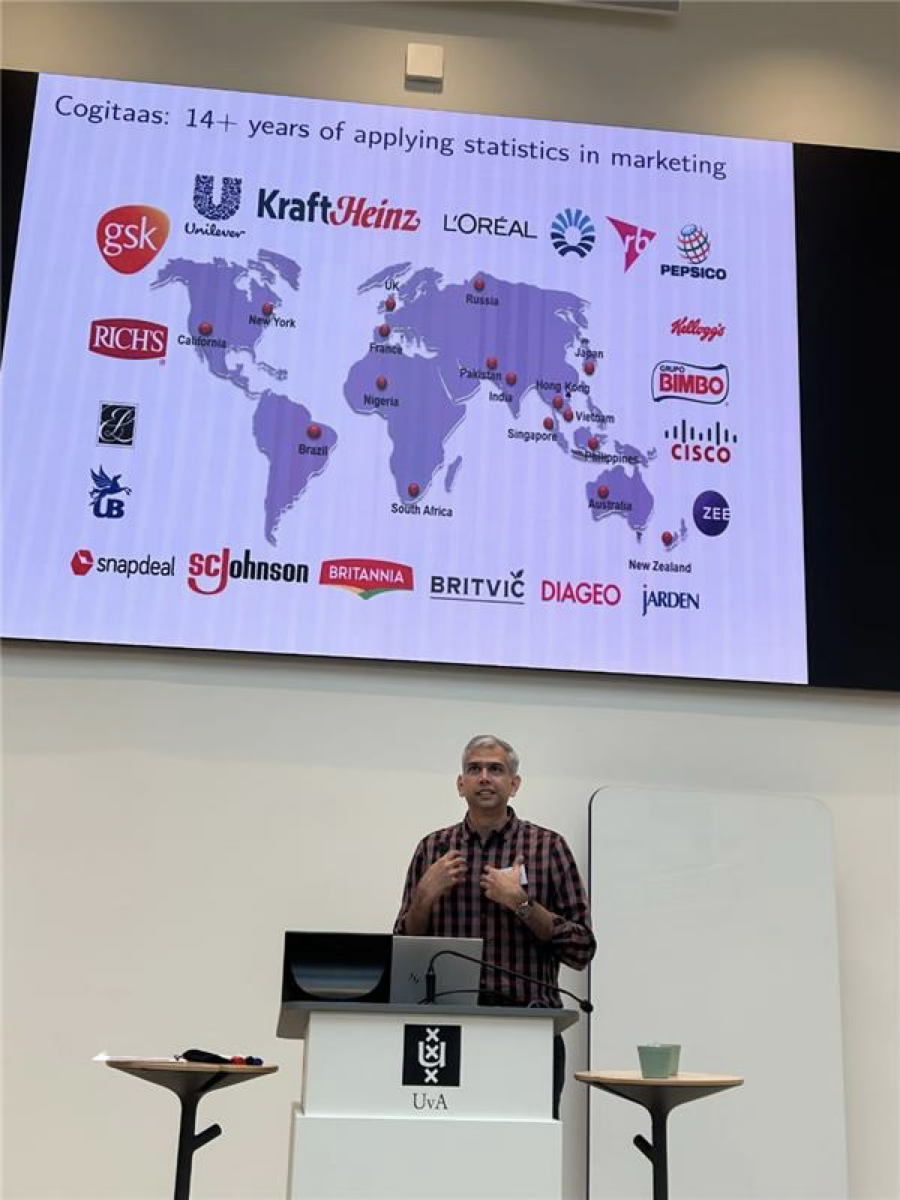 Balaji Raman presenting breakthrough innovations at a conference in Amsterdam